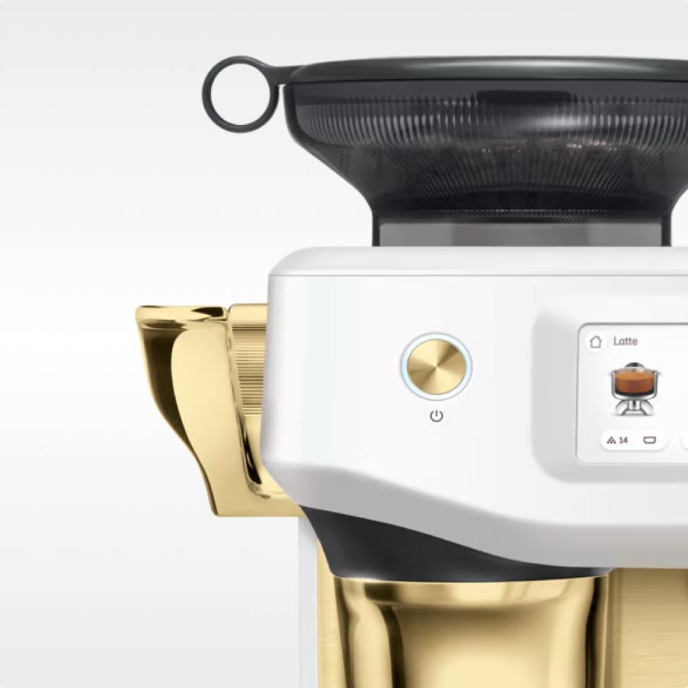 espresso machine with sea salt and brass finish.